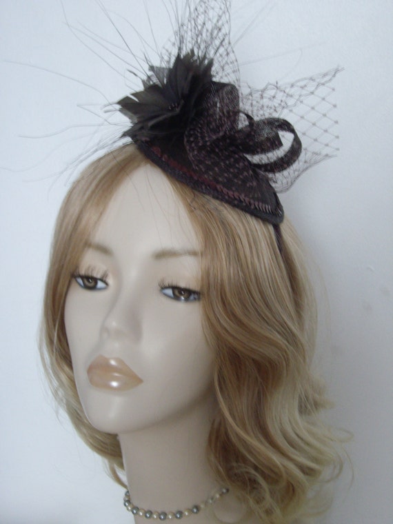 CHOCOLATE BROWN FASCINATOR Made of Sinamay disc and Feather