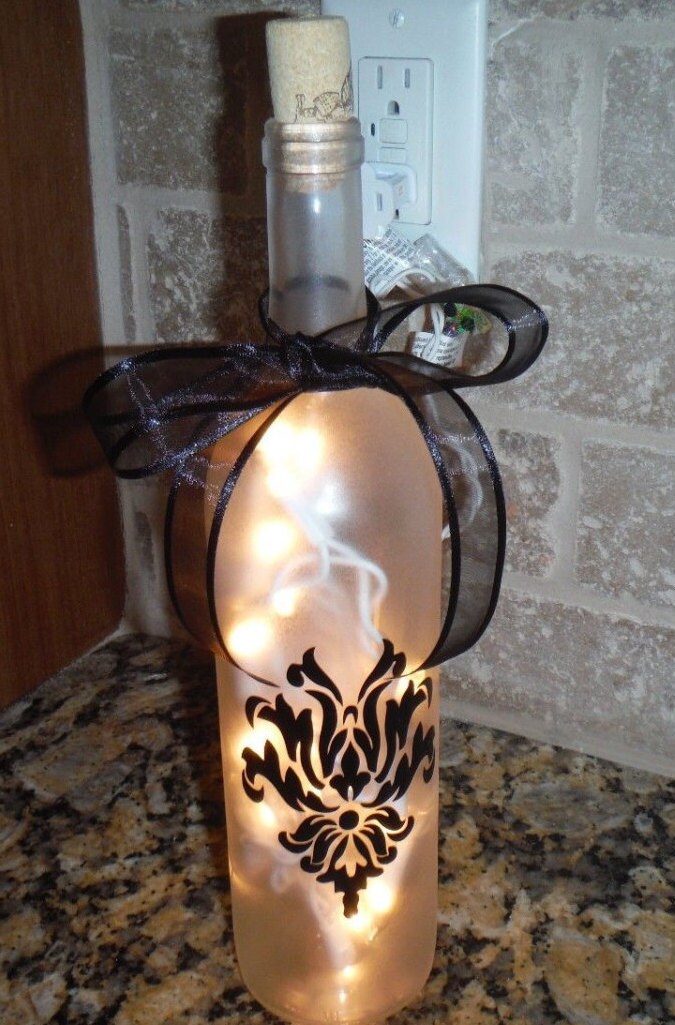 Frosted Lighted Wine Bottle with a Damask Design by KBDecorDesigns