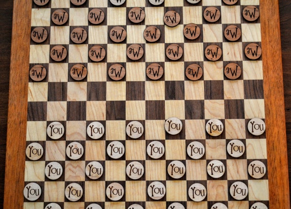 Canadian Draughts with personalized pieces! With 30 checkers per side, this "checkers on steroids" game will make you re-think Checkers!