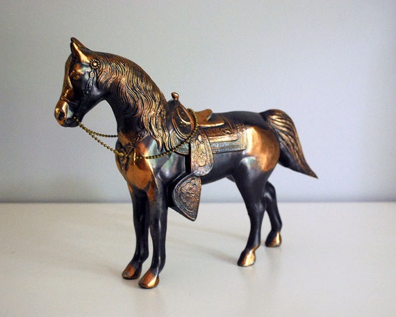 old metal horse figurines