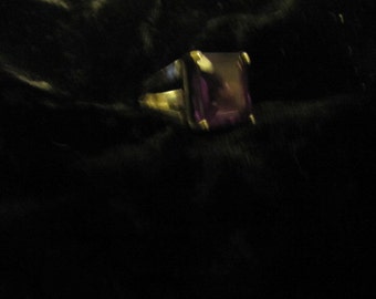 A nice simulated amythest ring