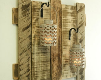 Pallet wall decor with colored hanging by PineknobsAndCrickets