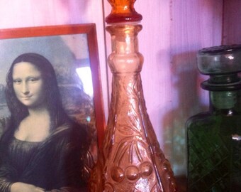 Mid winter SALE ....Amber 1970s glass genie bottle decanter .