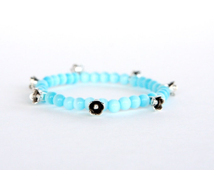 Zen flower charm stretch bracelet with Tigre eye beads