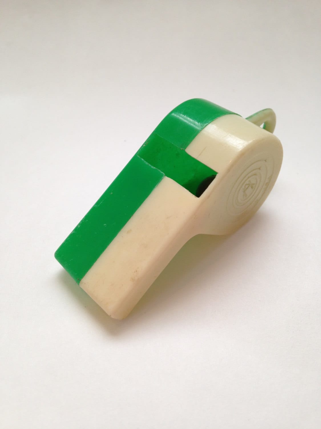 green . WHISTLE // Plastic vintage white & green toy whistle