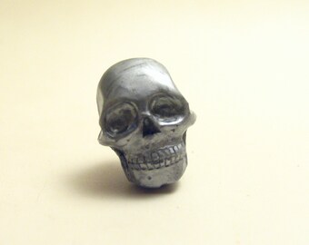 Tiny silver Skull lapel pin