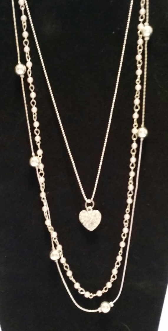 Three tier silver necklace with heart
