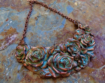 Distressed copper rose bouquet bib necklace