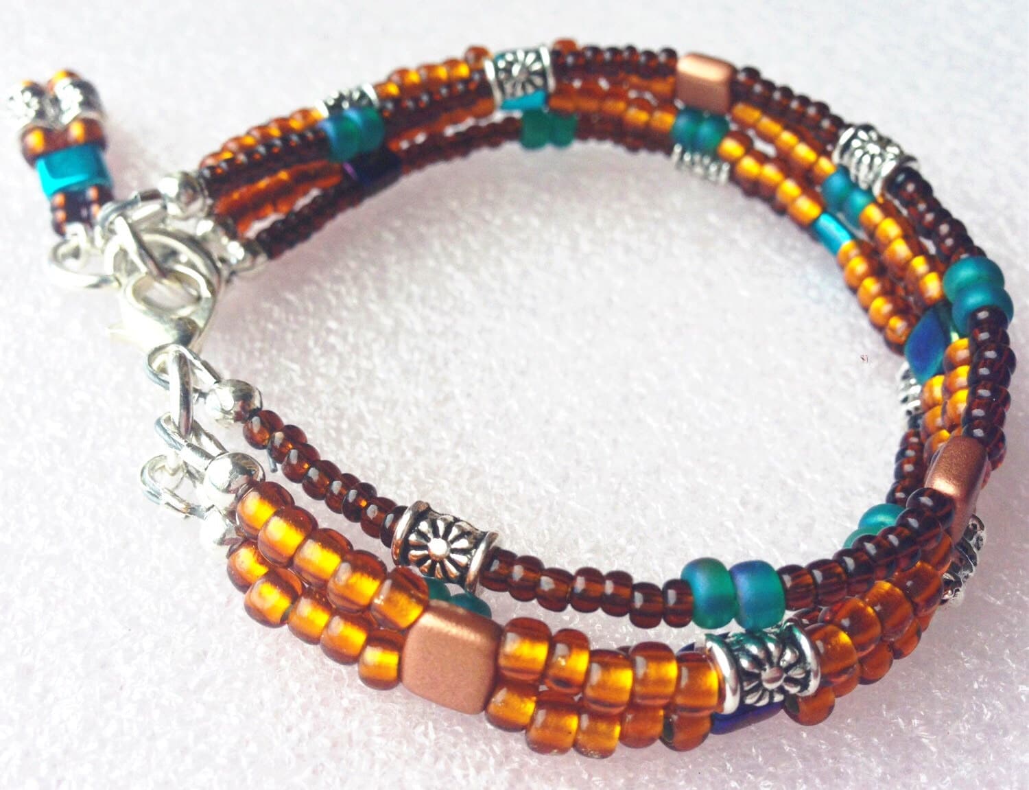 Beaded bracelet multi strand turquoise topaz brown and
