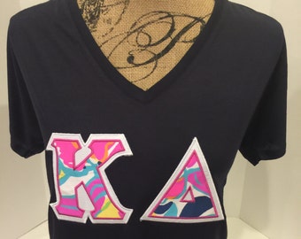 BELLA loose and flowy Greek Letter shirt with Lilly Pulitzer fabric letters - any Greek letters - stitched on Bella Flowy v-neck t-shirt.