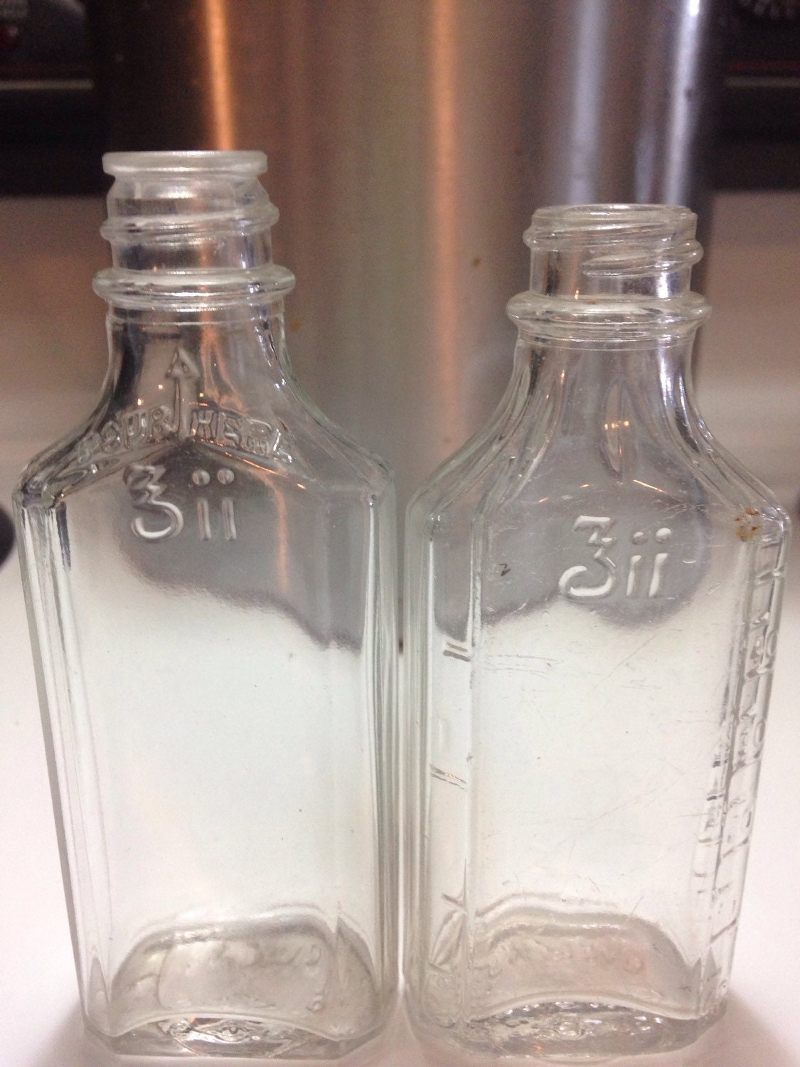 2 owens glass medicine bottles 3ii