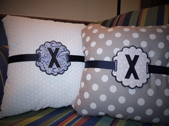 Xavier University pillow and pillow charm