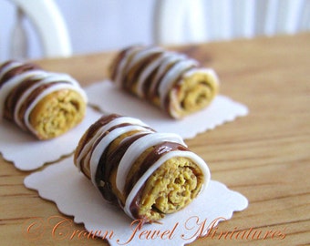 1:12 Chocolate Iced Coffee Roll Cake by IGMA Artisan Robin Brady-Boxwell - Crown Jewel Miniatures