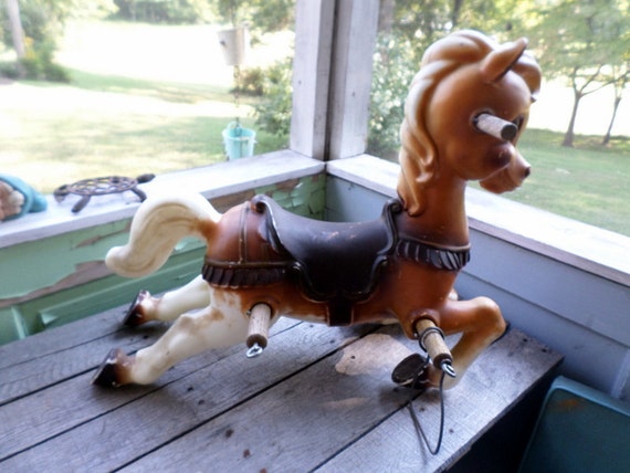 vintage plastic rocking horse