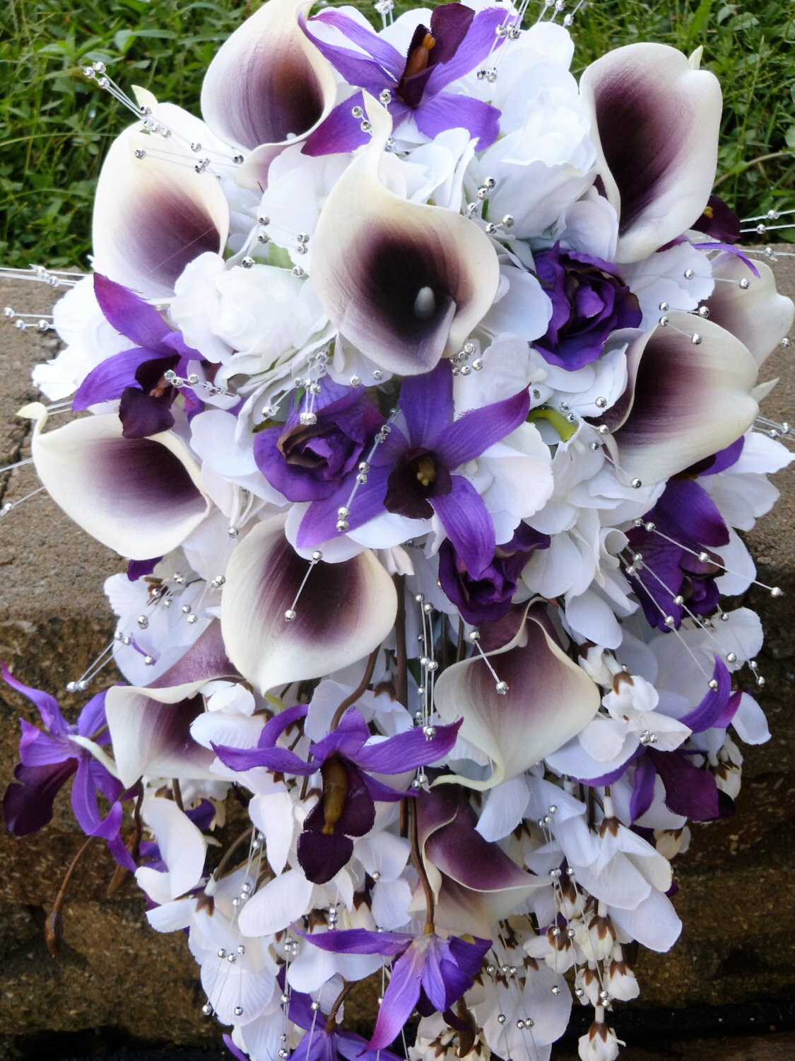 Cascading picasso calla lily hydrangea bouquet dendrobium
