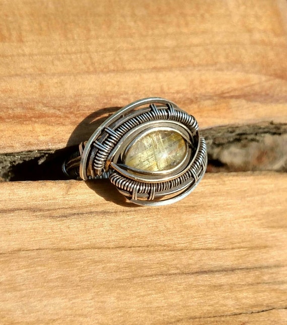 Sterling silver wire wrapped ring with rutilated quartz
