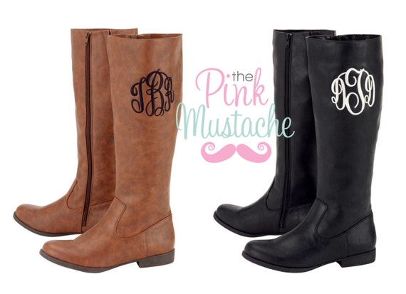monogram plaque long leather boots