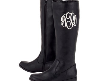 monogram plaque long leather boots