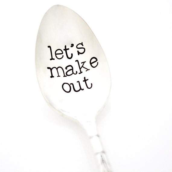 Hand stamped spoon let's make out. Stamped