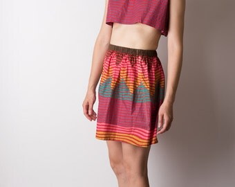 vintage 1980s striped RAINBOW two piece cropped top + mini skirt CHEVRON zig zag la crop gradient red tones 80s xs s