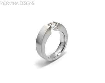 Modern tension engagement rings