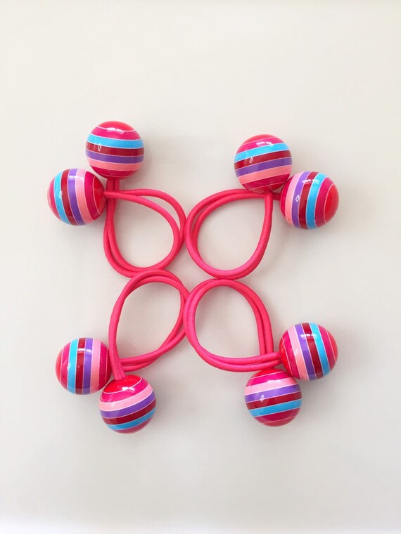 Big balls hair ties double ball elastic bands. Pair of fun