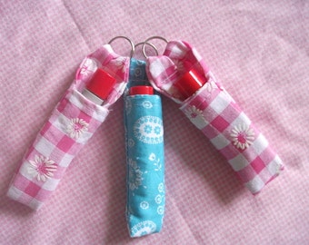 Lip balm key ring with free lip balm