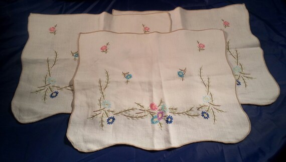 Trio of Vintage Table Scarves with Multi-colored flowers on a