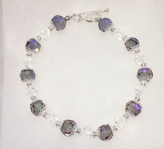 Items similar to Beautiful Swarovski crystal, bead and silver beaded
