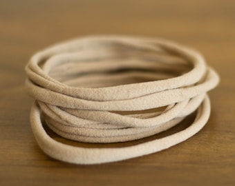 Nude nylon headband, black nylon headband, white nylon headband, Nude Nylon One-Size Fits All Headbands, Nylon Headband Supply, Wholesale