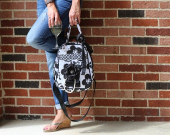 purse with wine spigot