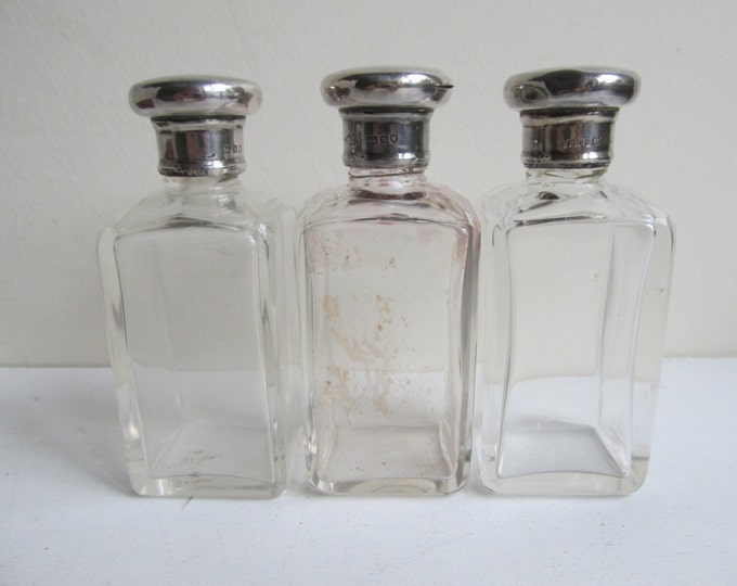Antique vanity set, Leather cased glass bottles, silver topped bottles, Hallmarked London 1908, with residue scent inside the bottles!