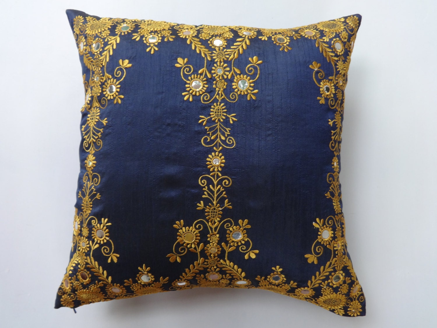 Navy blue pillow with gold embroidery mirror work pillow.