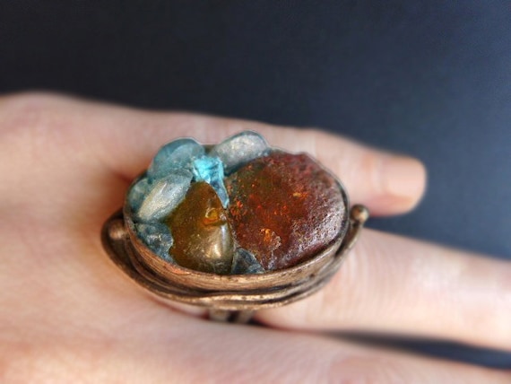 That Look of Otherness. Rustic Baltic Amber and apatite ring