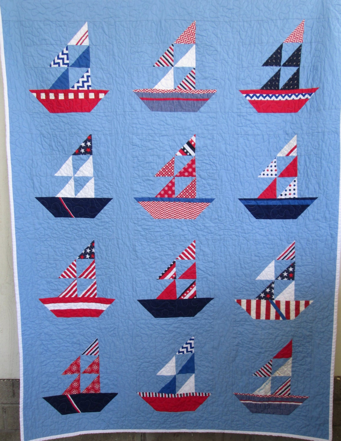 red sailboat quilt