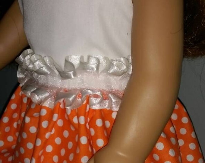 Orange polka dot dress fits dolls like American Girl and 18 inch dolls for summer