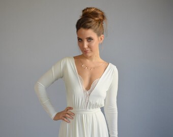 Simple wedding dress floor length, lace cleavage ,bell shape skirt