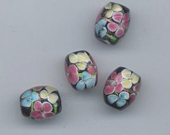 Nine pretty floral lampwork glass beads - 12.5 x 10 mm
