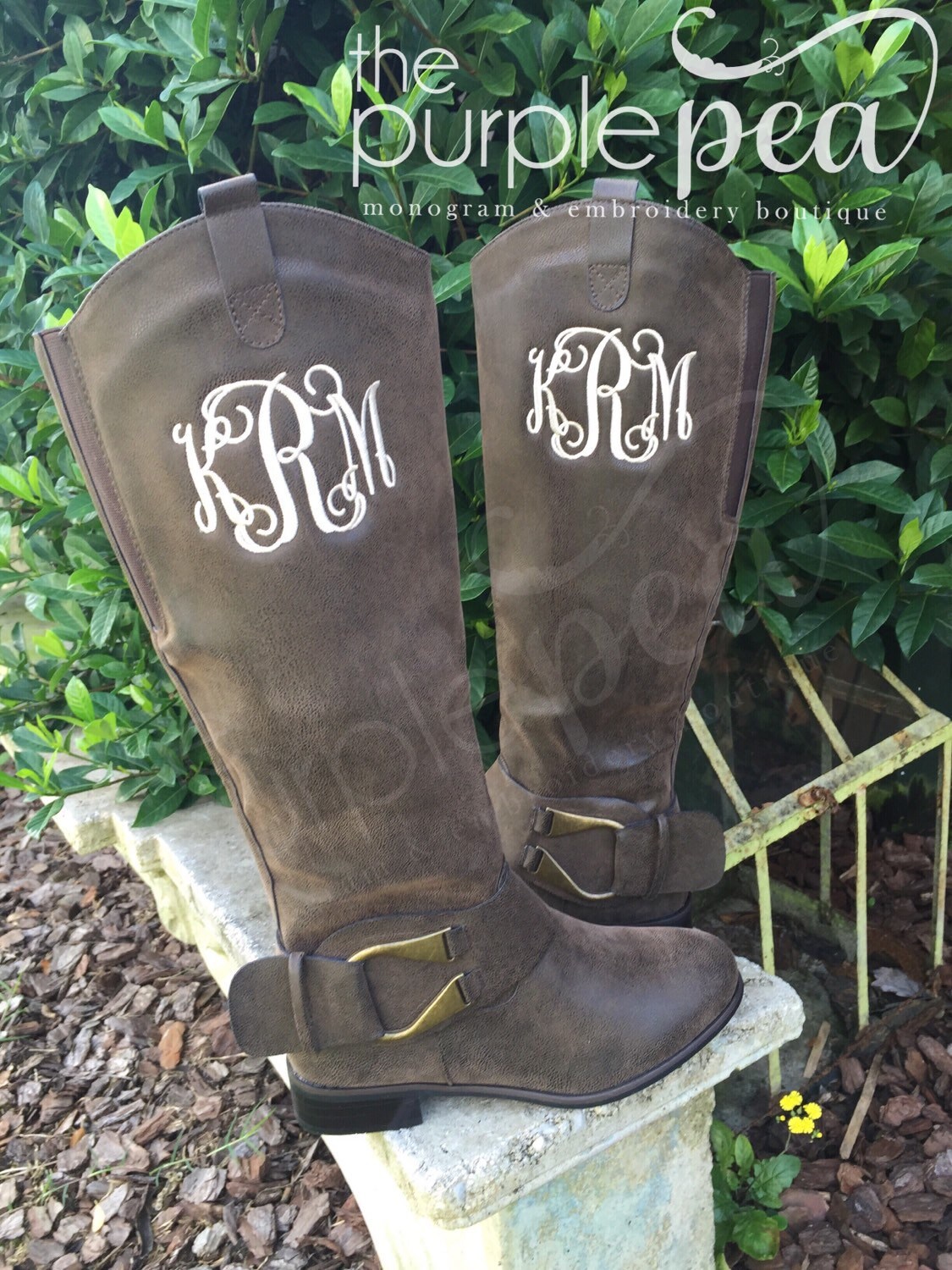 monogram plaque long leather boots
