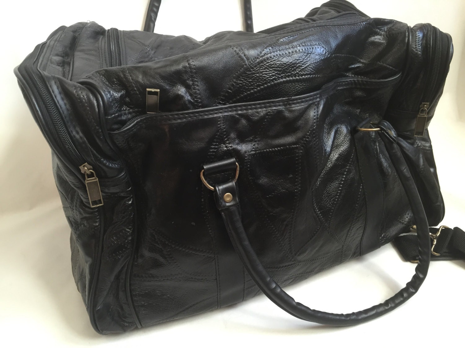 Black Leather Duffle Bag with Adjustable Shoulder Strap