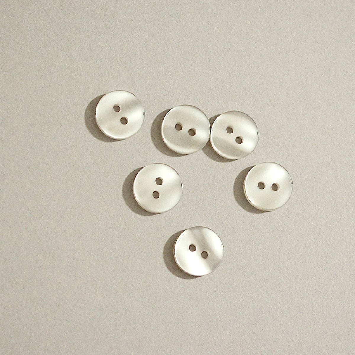 plastic buttons 1/2 round 6 buttons pearl white flat 2