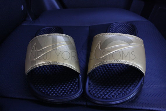 nike slippers black and gold