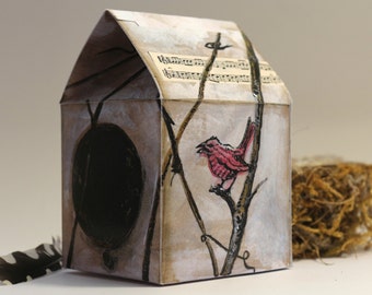 Petite maison en carton à monter.