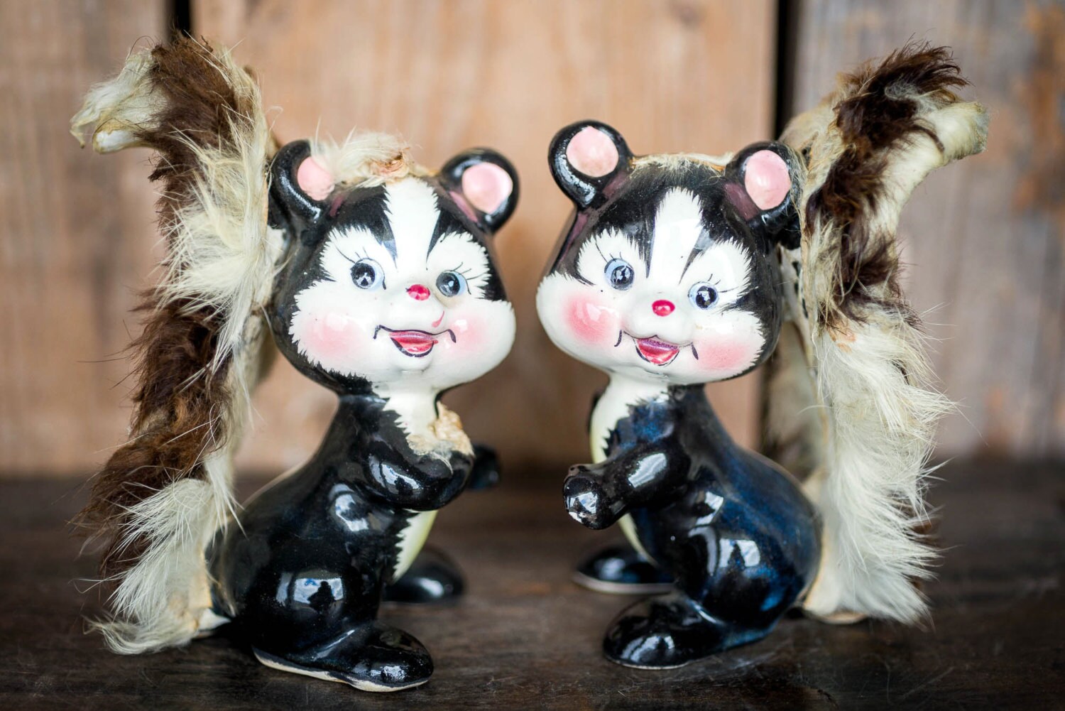 ceramic skunk figurines