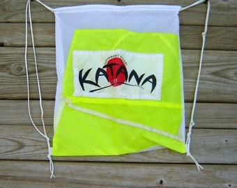 White Drawstring Backpack with Neon Yellow Katana Parachute End Panel Applique
