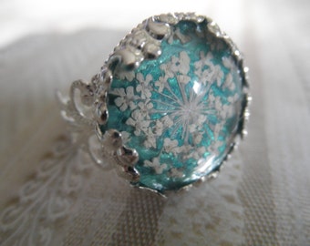 Queen Anne's Lace Filigree Pressed Flower Glass Crown Ring Atop Caribbean Ocean Blue Green Background-Symbolizes Peace-Gifts Under 20
