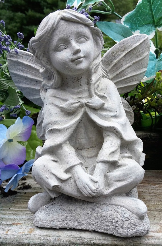 concrete fairy statue