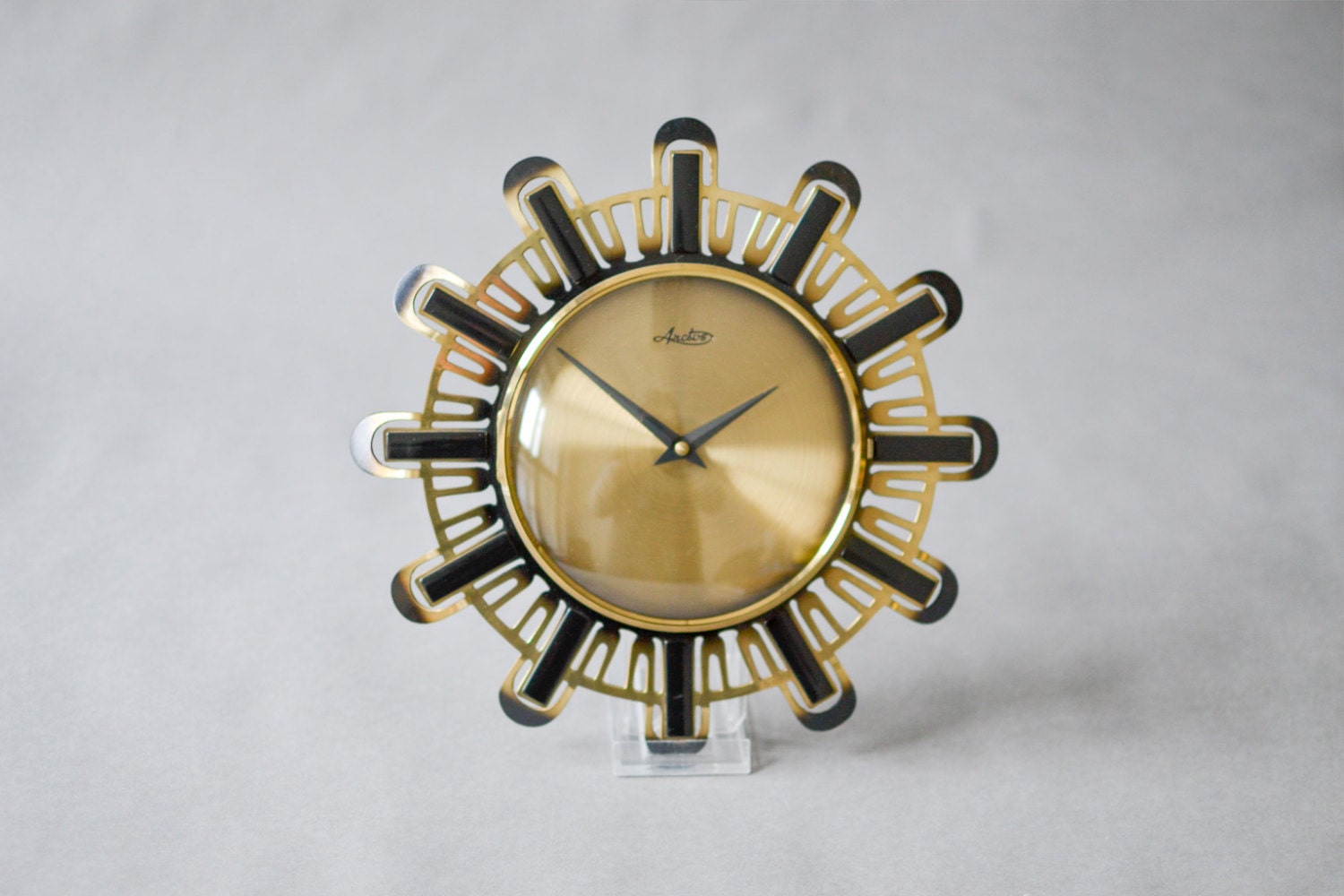 RESERVED Vintage clock brass West German wall clock starburst