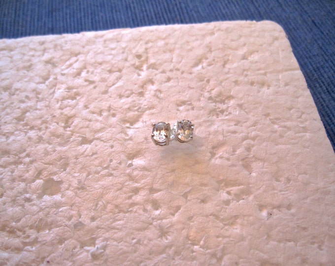 White Topaz Studs, 7x5mm Oval, Natural, Set in Sterling Silver E839