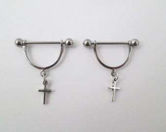 Cross nipple piercing